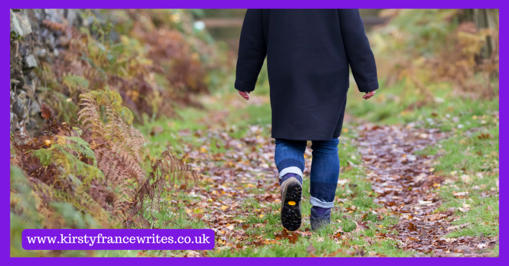 Image shows a woman in a coat, jeans and boots walking away from the camera. It's me, having realised it was time to say goodbye.