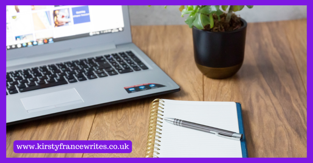 How do you use AI? Image shows a laptop and notepad used to ponder this question.